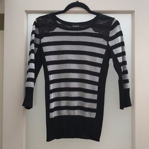 A Byer Black and Grey Striped 3/4 sleeve sweater